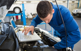 Technican Working on a Vehicle